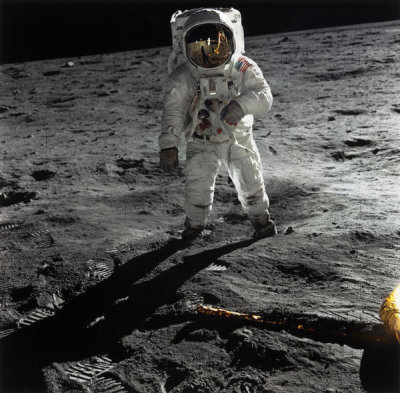 Neil Armstrong - Buzz Aldrin Walking on the Surface of the Moon near a Leg of the Lunar Module, 1969